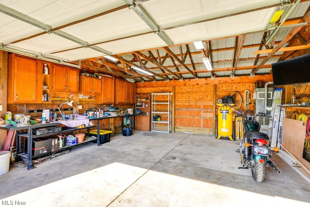 3417 Lake Rockwell Road Ravenna, OH 44266 - Photo 25 of 35 Garage with a workshop area