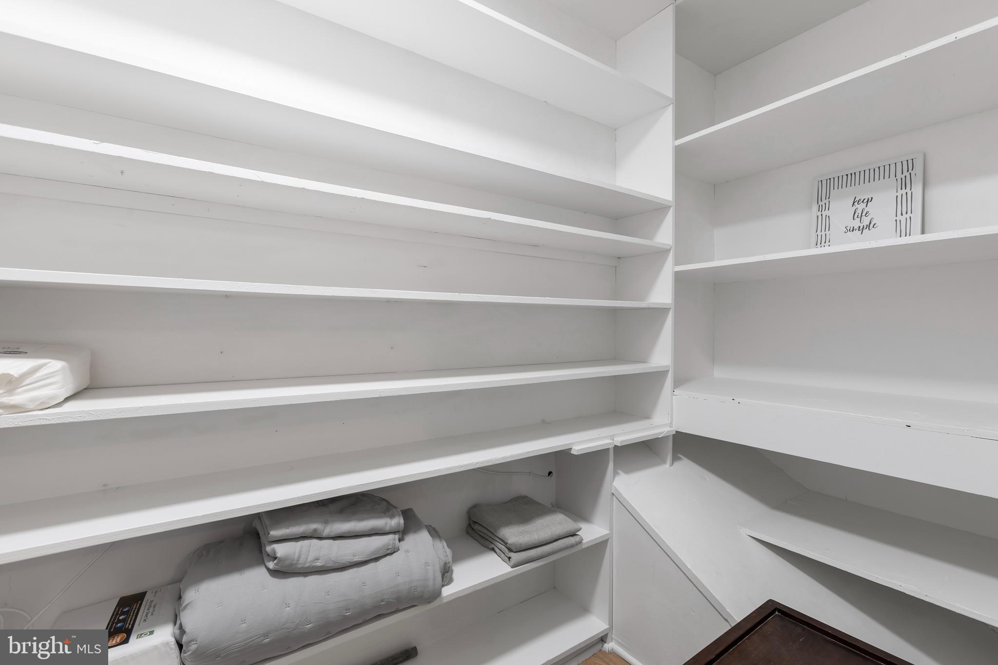 1900 Princess Anne Street, Unit 6 Fredericksburg, VA 22401 - Photo 15 of 19 a view of walk in closet with empty racks