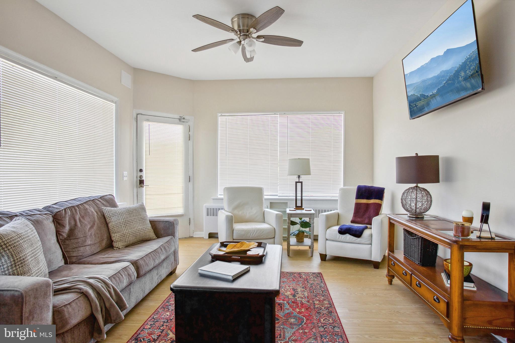 1900 Princess Anne Street, Unit 6 Fredericksburg, VA 22401 - Photo 4 of 19 a living room with furniture and a rug
