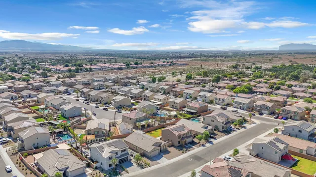 a view of a brick building with many windows