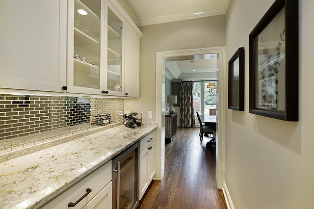 2246 Illinois Road Northbrook, IL 60062 - Photo 6 of 25 a view of a kitchen with a sink and wooden floor