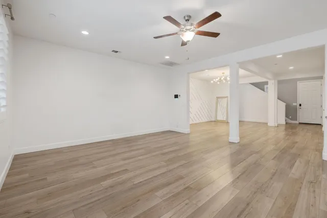 a kitchen with stainless steel appliances granite countertop a sink and cabinets