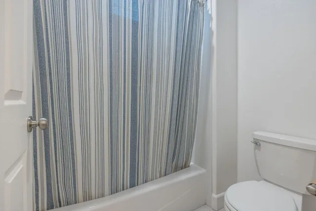 a view of a big room with a big yard and plants