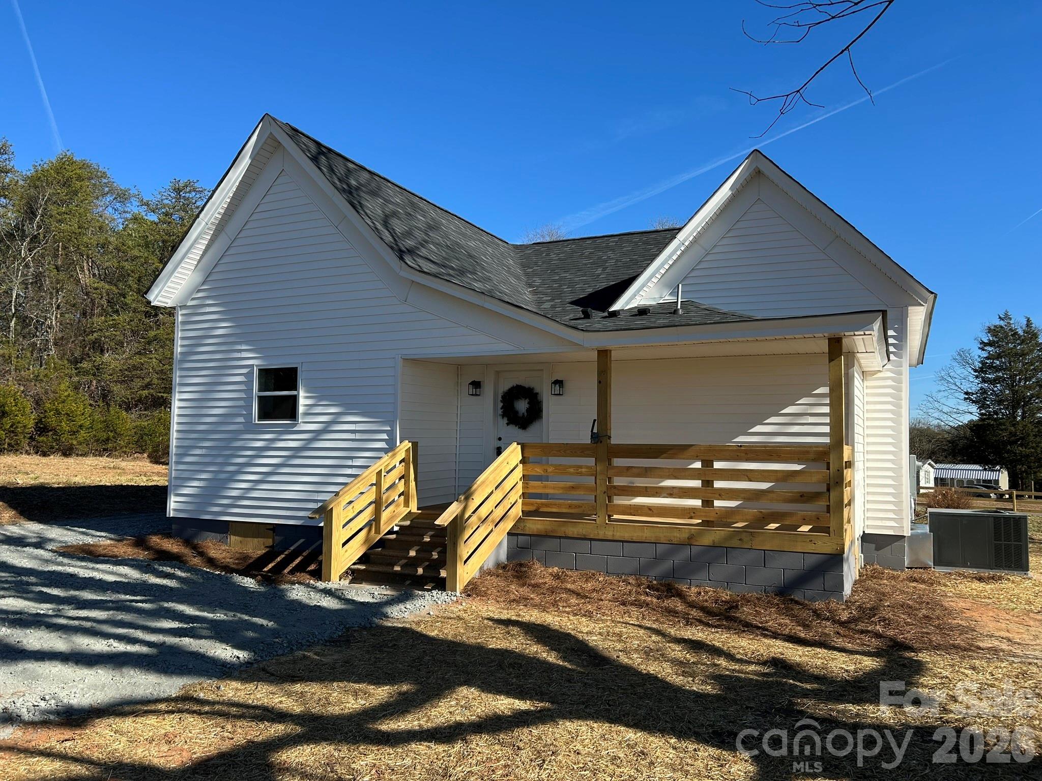 464 Hamrick Road Mooresboro, NC 28114 - Photo 2 of 47 a front view of a house with barbeque