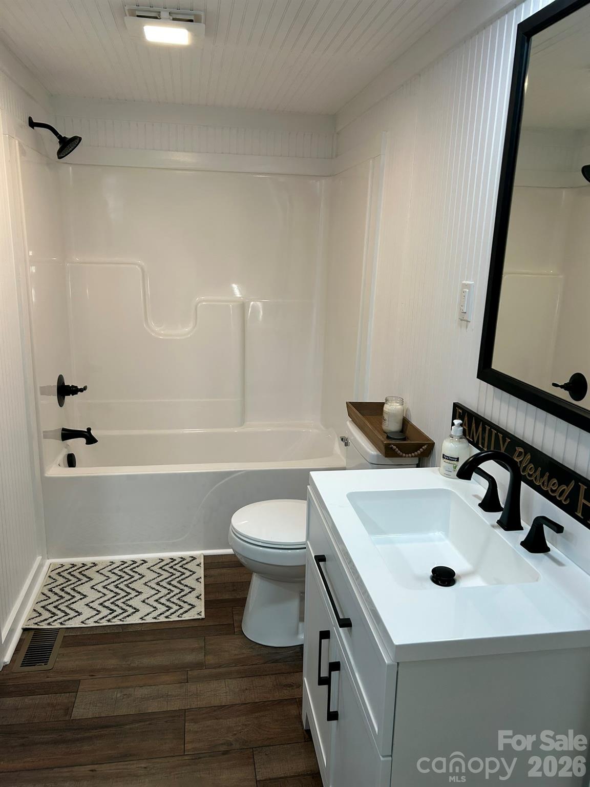 464 Hamrick Road Mooresboro, NC 28114 - Photo 26 of 47 a bathroom with a sink a toilet and shower