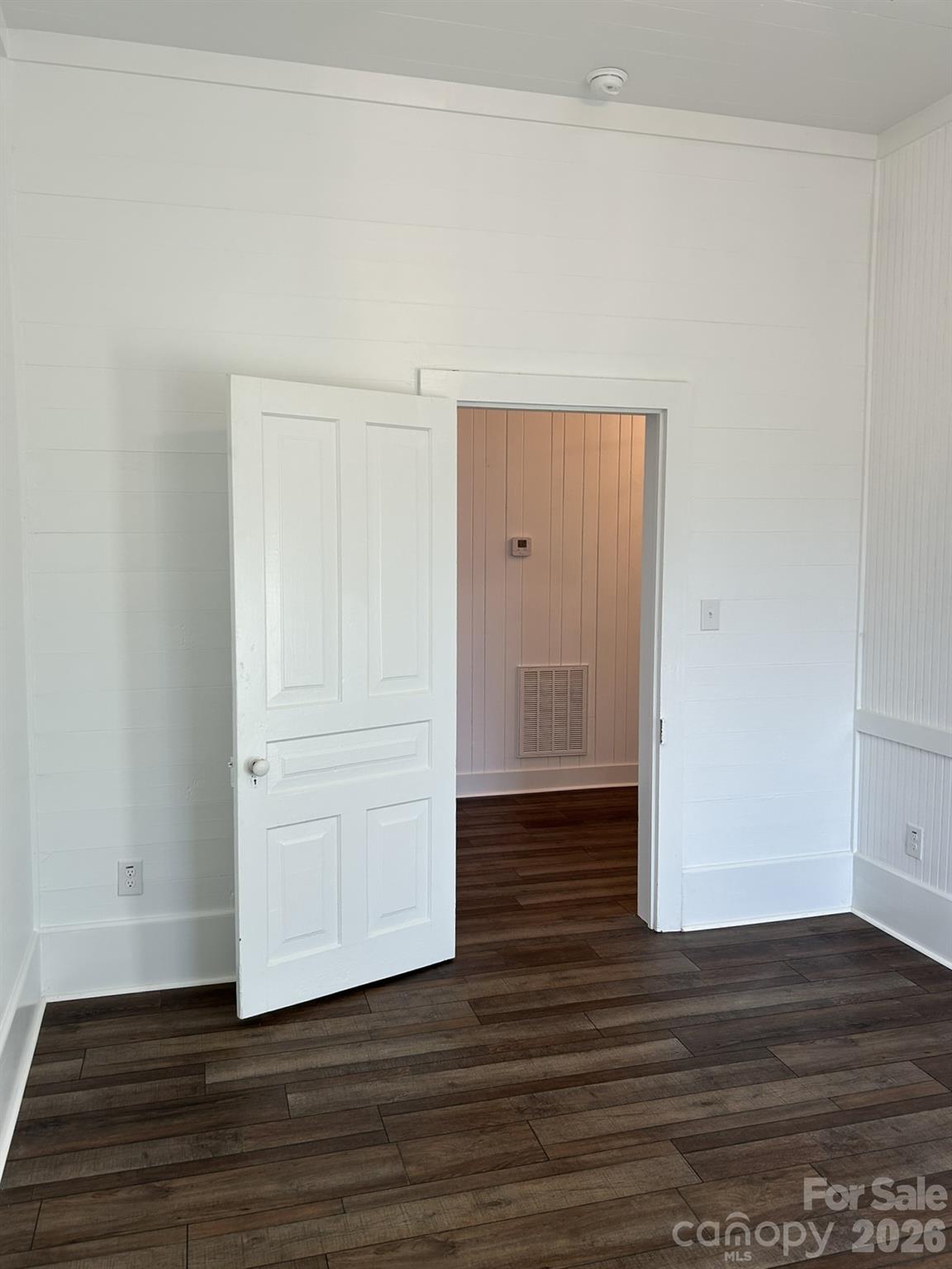 464 Hamrick Road Mooresboro, NC 28114 - Photo 29 of 47 a view of an empty room with wooden floor