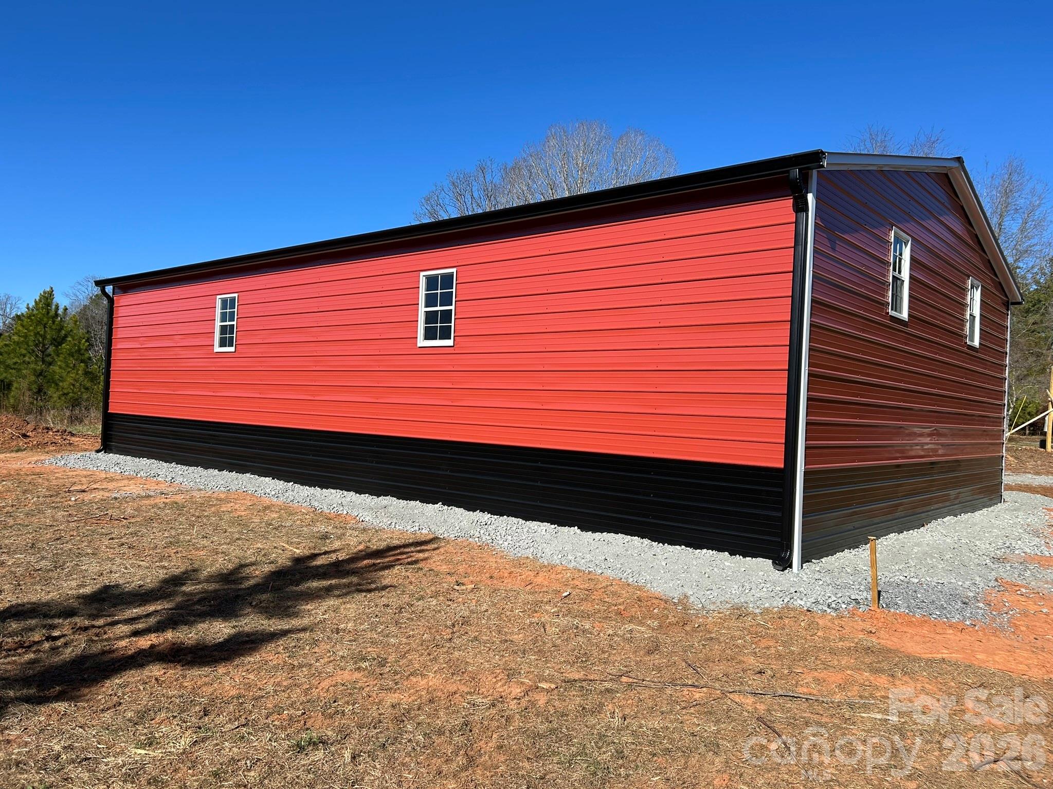 464 Hamrick Road Mooresboro, NC 28114 - Photo 45 of 47 a view of a back yard of the house