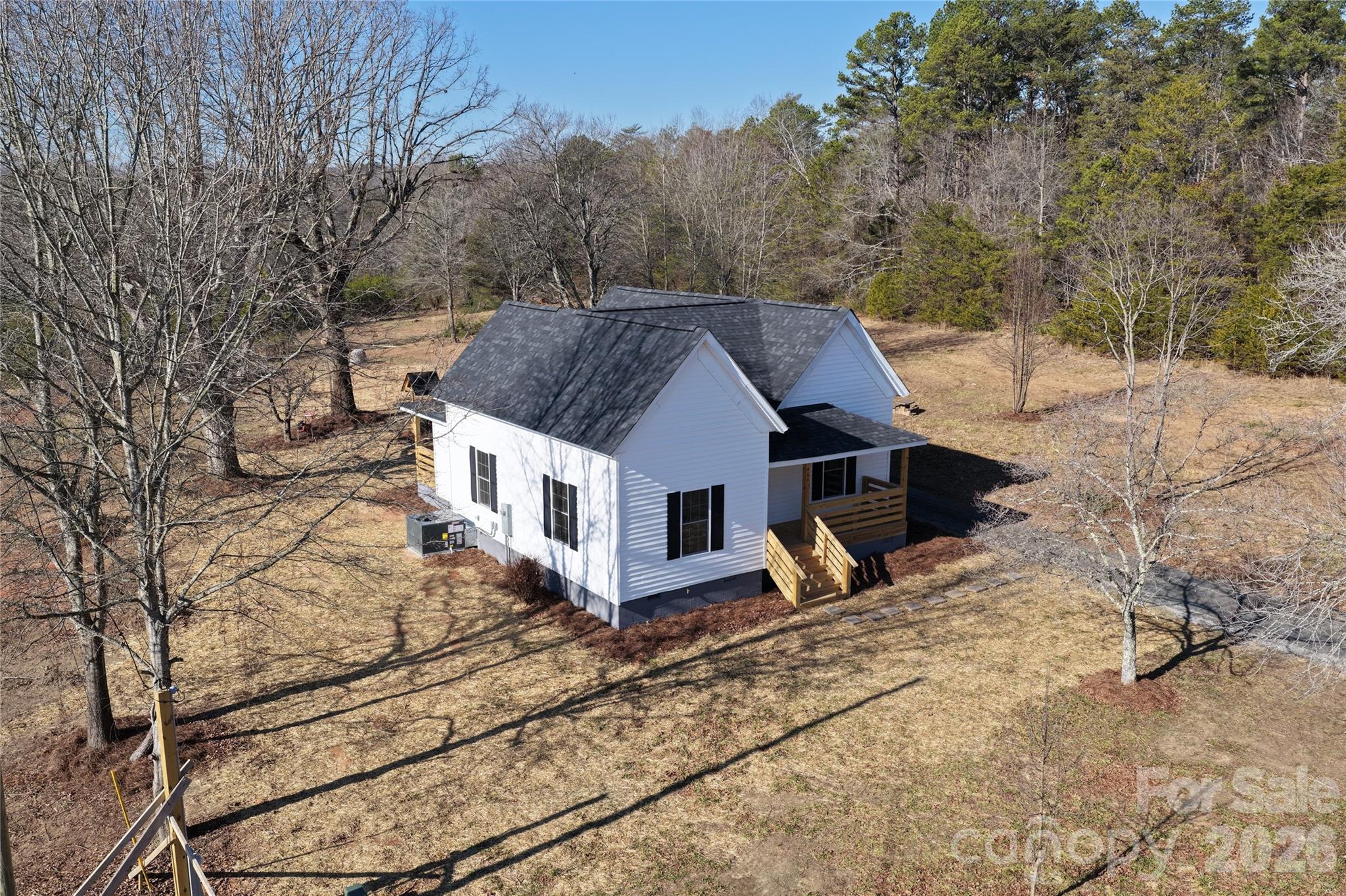 464 Hamrick Road Mooresboro, NC 28114 - Photo 5 of 47 a view of a house with a yard