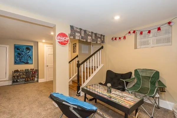 a living room with furniture and a table