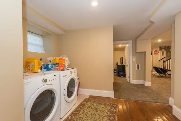 a view of a storage & utility room with washer and dryer