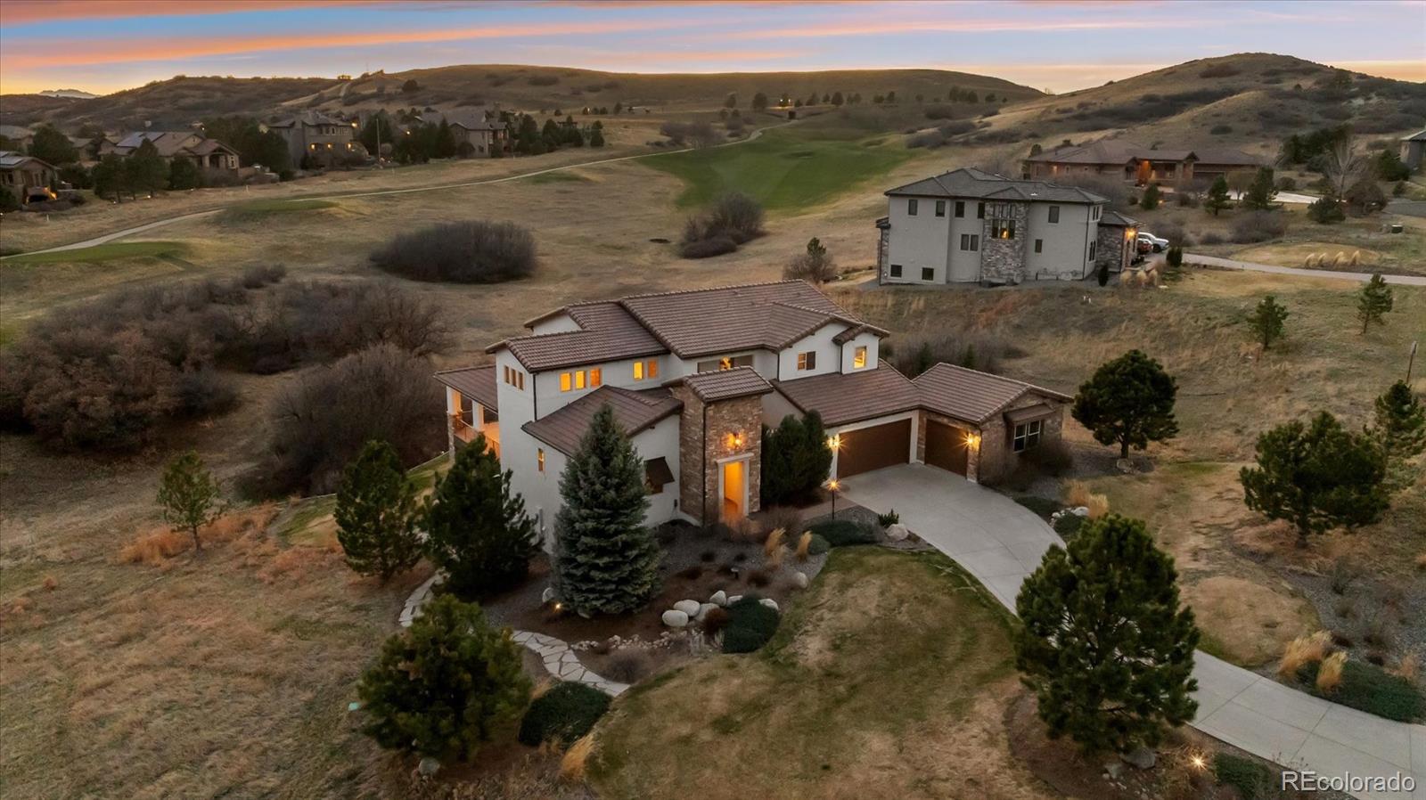 4698 Bandera Place Parker, CO 80134 - Photo 2 of 43 a view of a town with mountains in the background