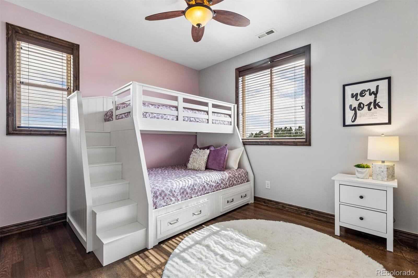 4698 Bandera Place Parker, CO 80134 - Photo 30 of 43 a bedroom with a bed and a window