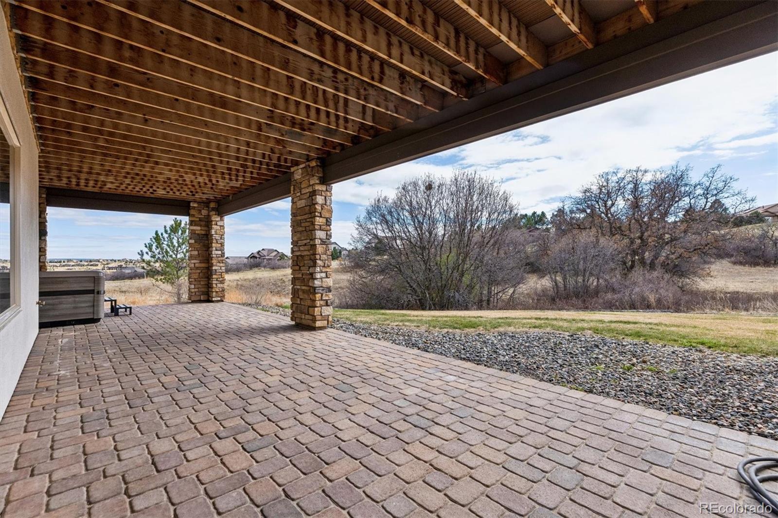 4698 Bandera Place Parker, CO 80134 - Photo 38 of 43 a view of a backyard of the house
