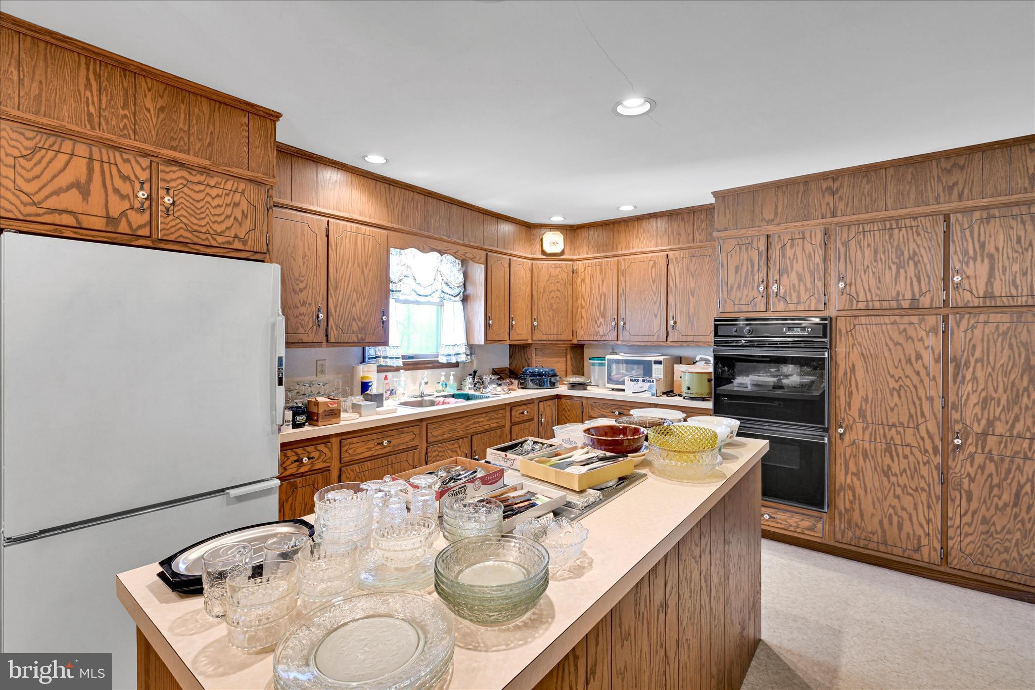 91 Williams Road Myerstown, PA 17067 - Photo 11 of 40 a kitchen with a sink stove and refrigerator