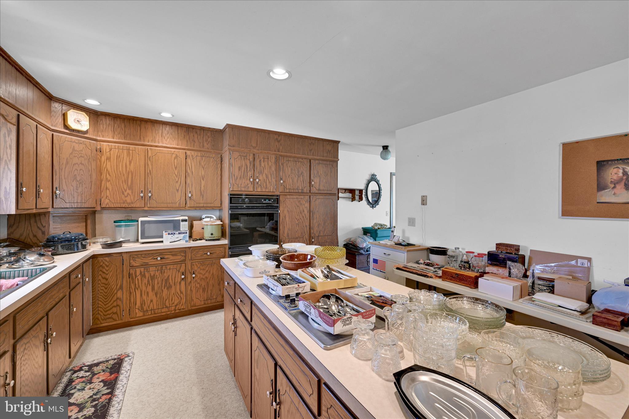 91 Williams Road Myerstown, PA 17067 - Photo 12 of 40 a kitchen with stainless steel appliances granite countertop a sink stove and refrigerator