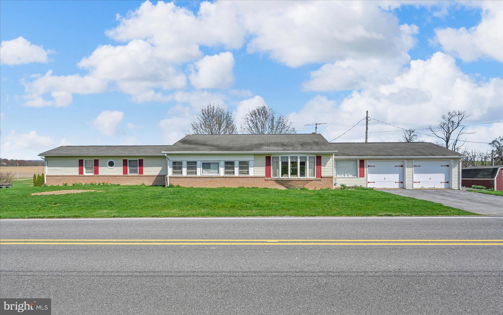 91 Williams Road Myerstown, PA 17067 - Photo 4 of 40 a front view of a house with a garden and entertaining space