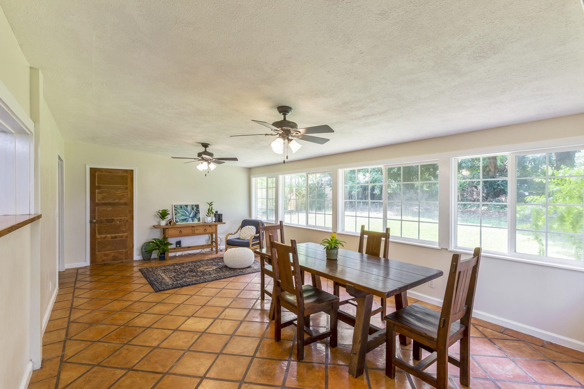 815 Kuulei Street Haiku, HI 96708 - Photo 14 of 25 a dining room with furniture and window