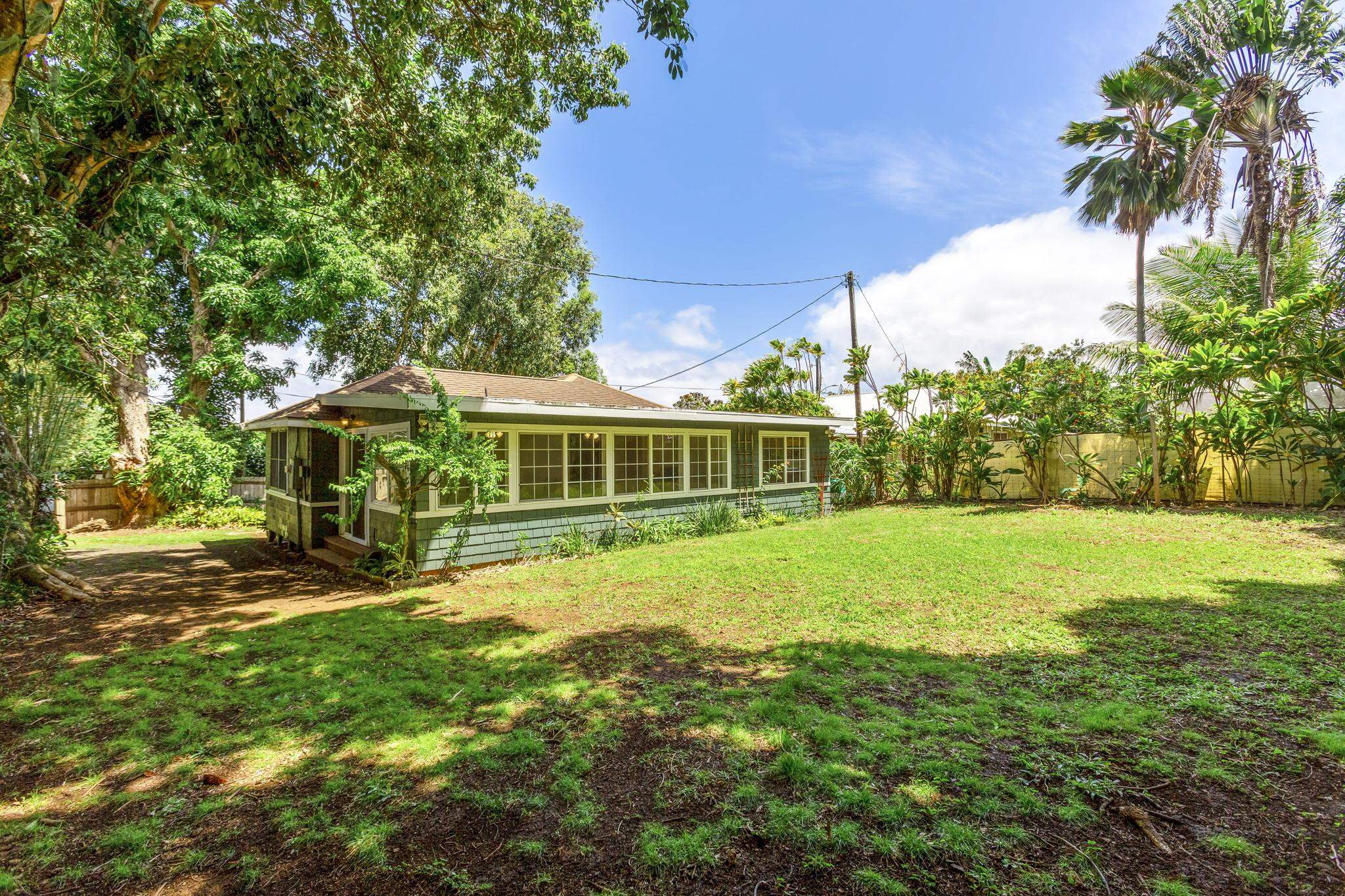 815 Kuulei Street Haiku, HI 96708 - Photo 19 of 25 a view of a house with a yard