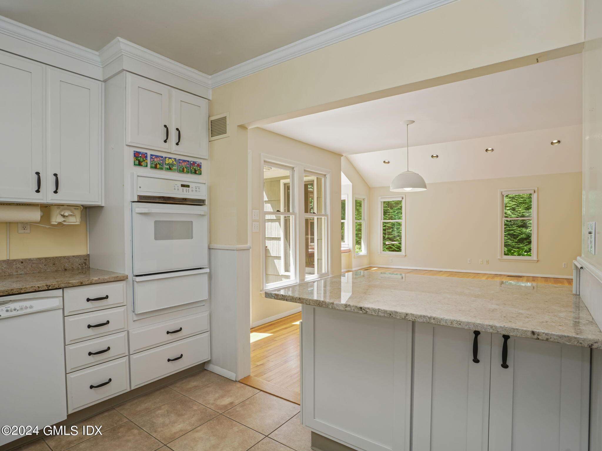 28 Dandy Drive Cos Cob, CT 06807 - Photo 13 of 35 a kitchen with cabinets appliances and a window