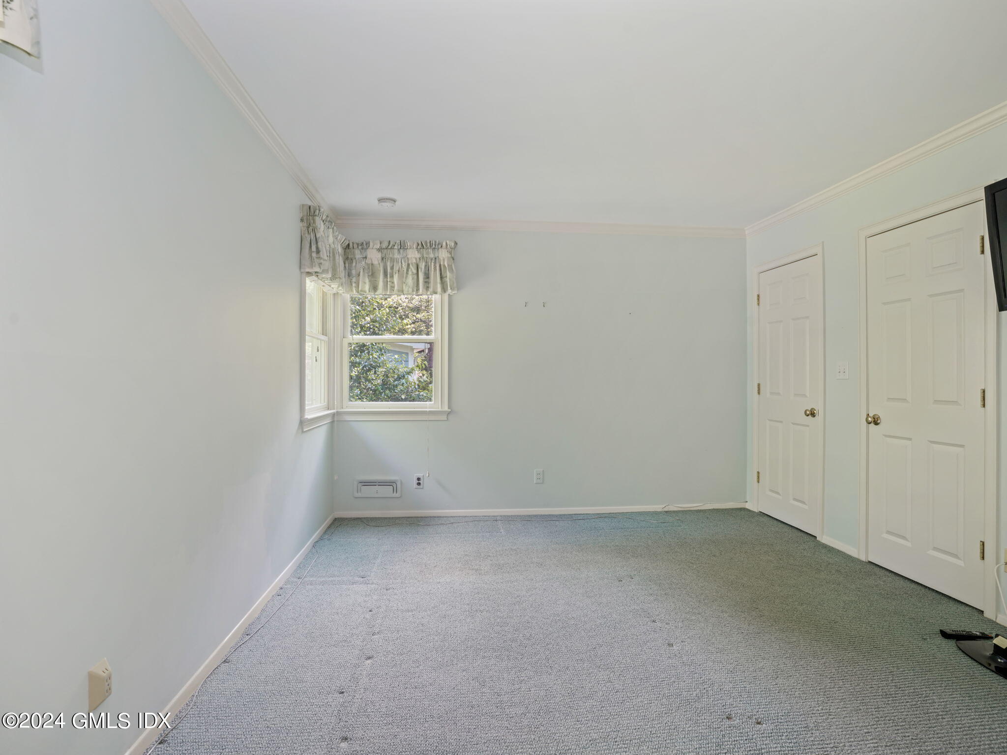 28 Dandy Drive Cos Cob, CT 06807 - Photo 18 of 35 an empty room with a window