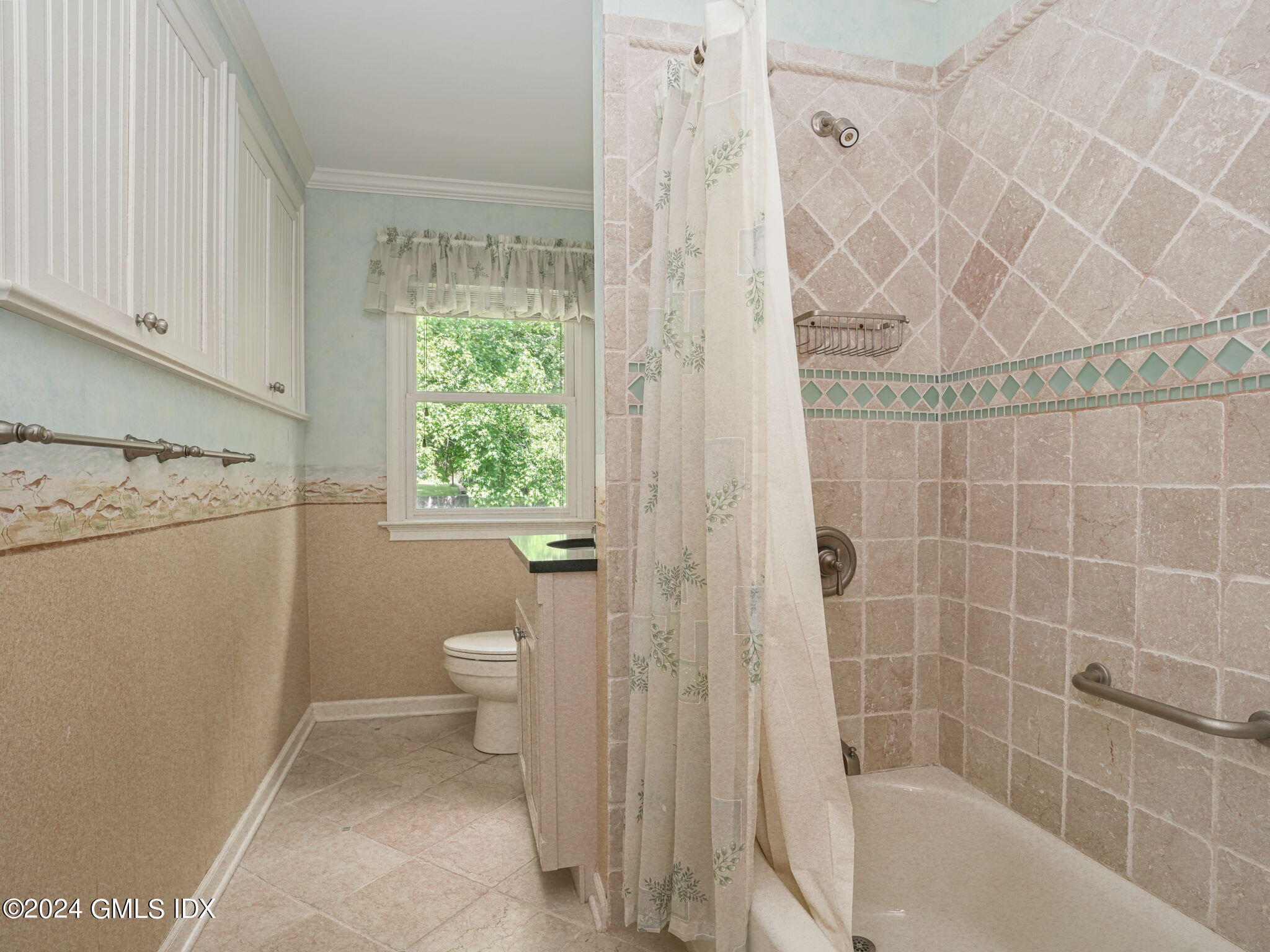 28 Dandy Drive Cos Cob, CT 06807 - Photo 24 of 35 a bathroom with a granite countertop sink a toilet and shower