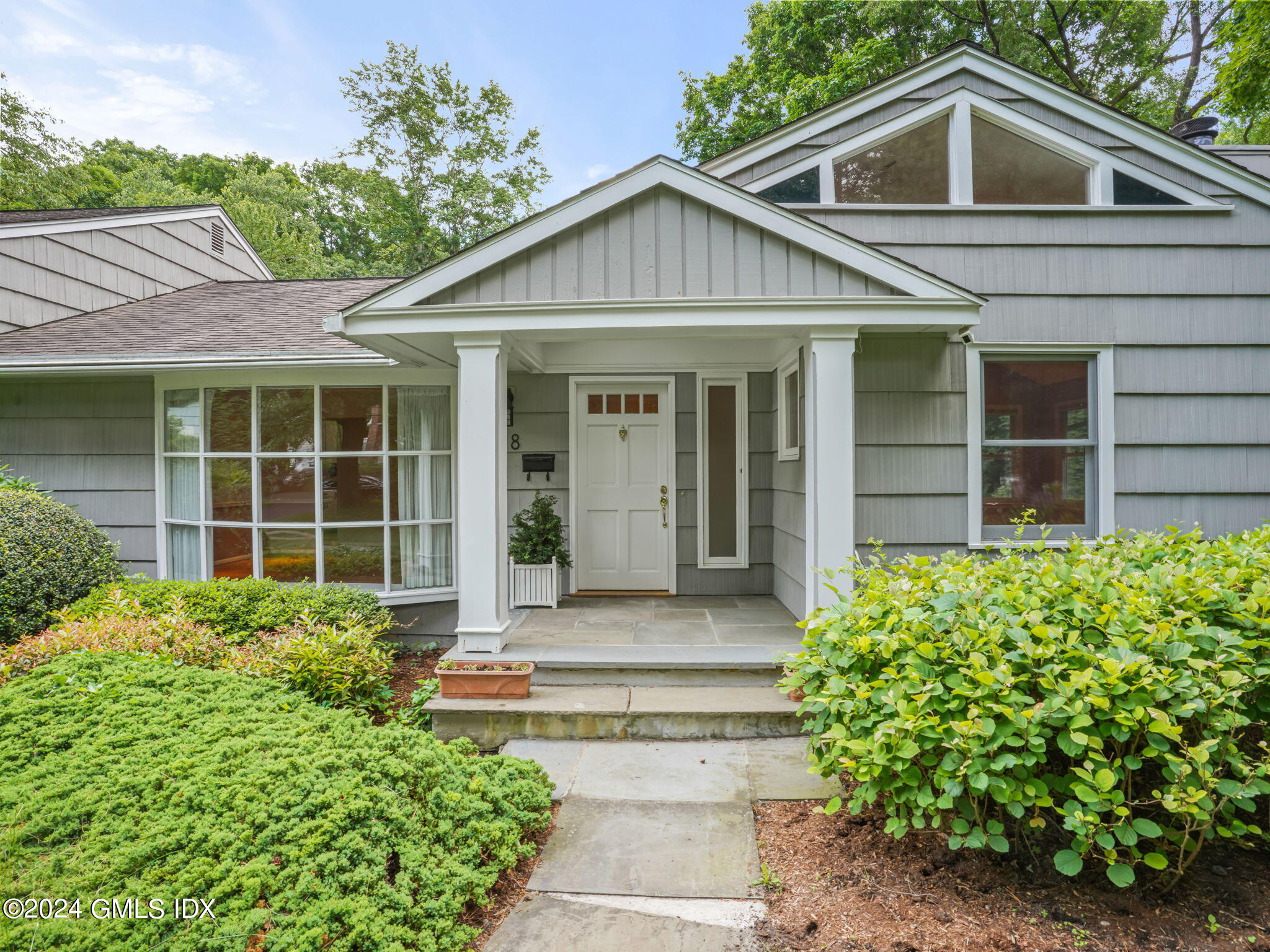 28 Dandy Drive Cos Cob, CT 06807 - Photo 35 of 35 a front view of a house with a yard