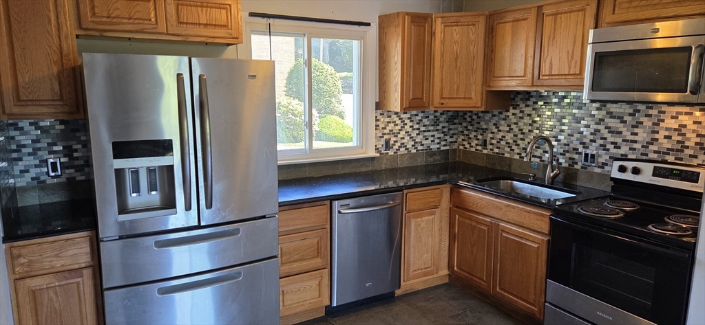 22 Jacqueline Road, Unit F Waltham, MA 02452 - Photo 1 of 4