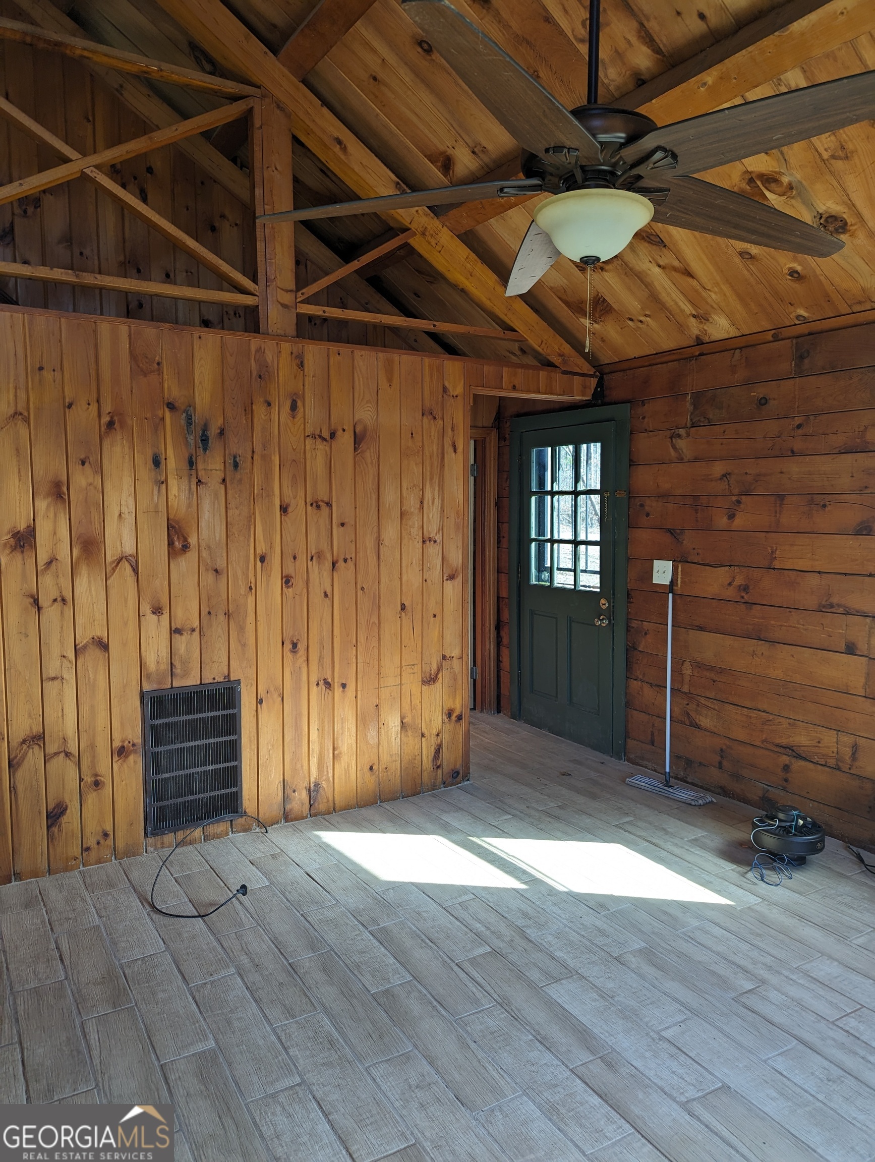 14 Cherokee Resort Road Pine Mountain, GA 31822 - Photo 10 of 16 a view of an empty room with wooden floor and a window