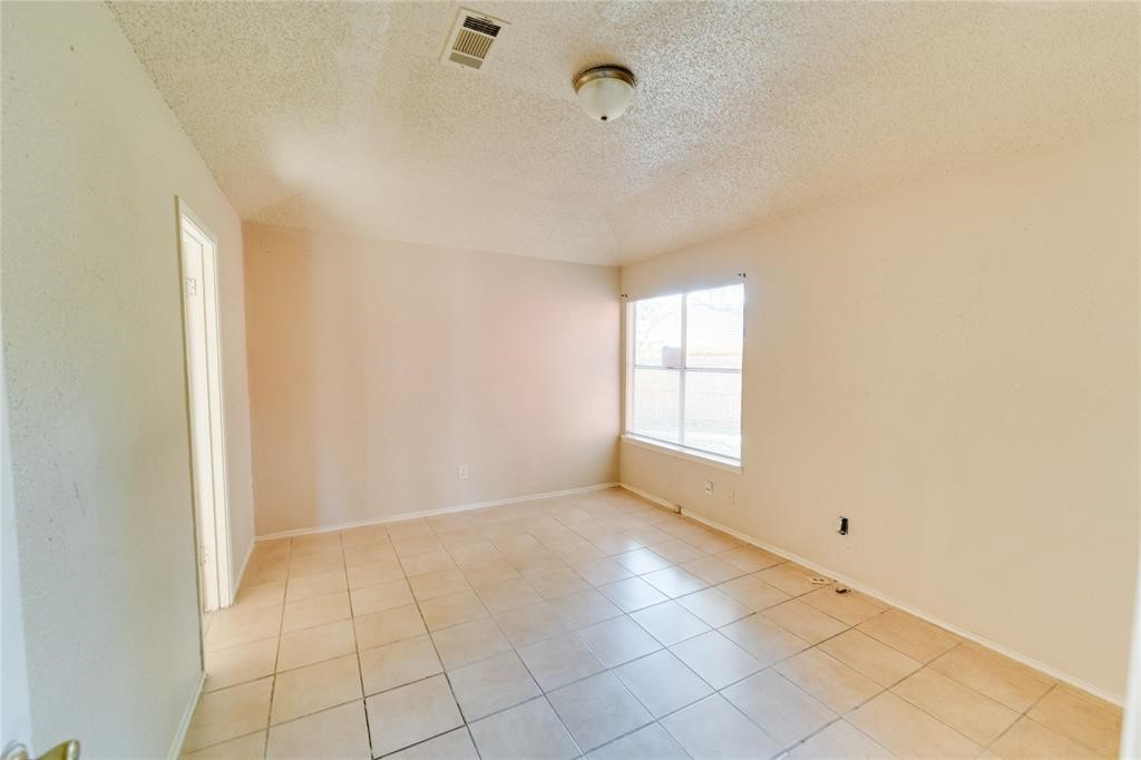 1539 Stevenage Lane Channelview, TX 77530 - Photo 11 of 15 a view of an empty room with a window