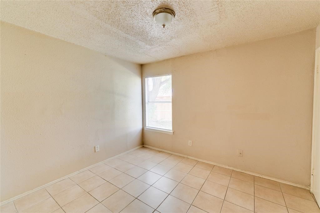 1539 Stevenage Lane Channelview, TX 77530 - Photo 8 of 15 a view of an empty room and window