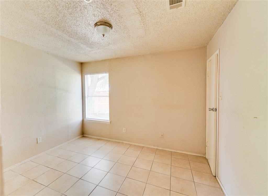 1539 Stevenage Lane Channelview, TX 77530 - Photo 10 of 15 a view of an empty room and window