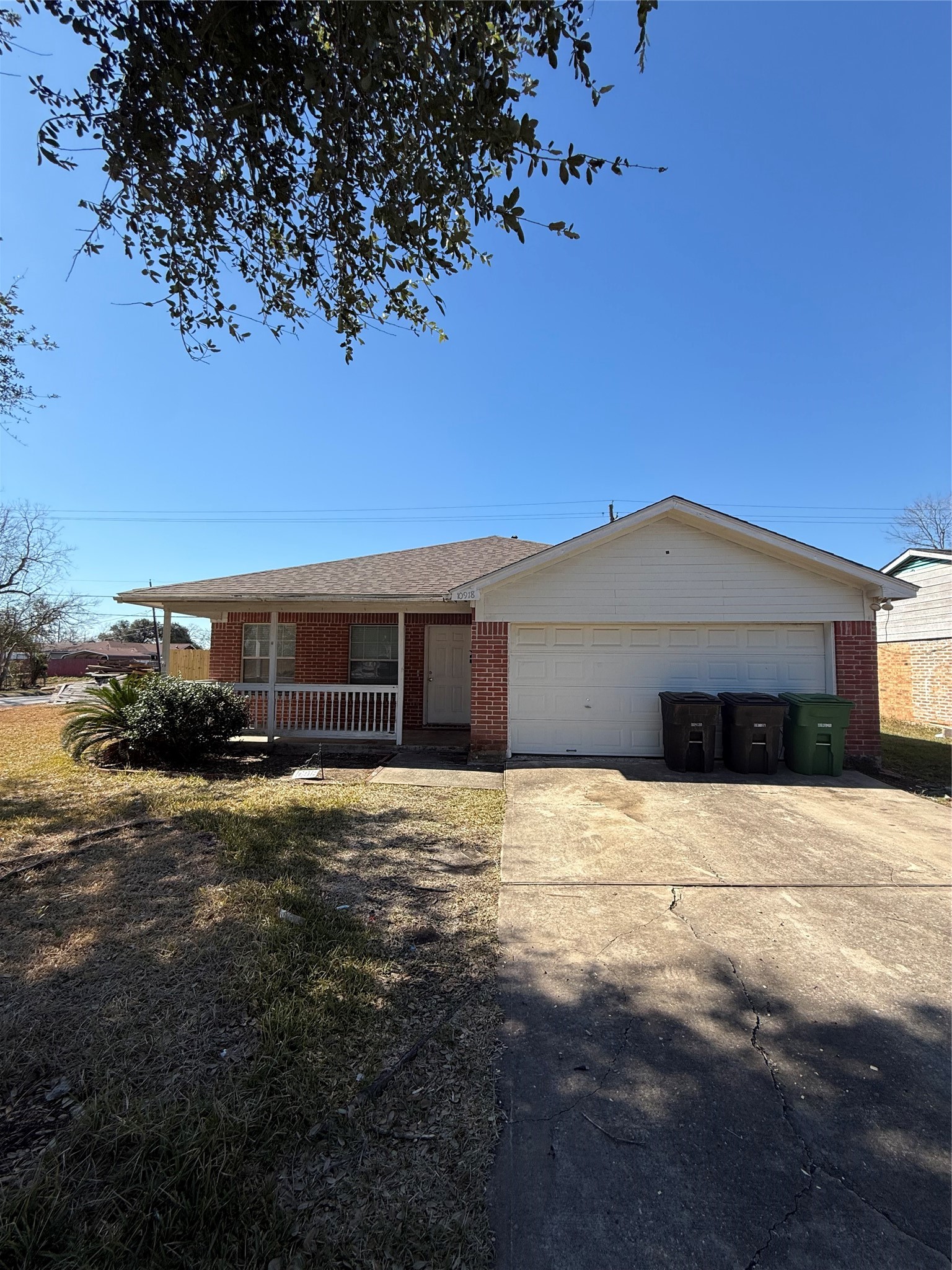 10918 Jutland Road Houston, TX 77048 - Photo 1 of 11 a front view of a house with a yard