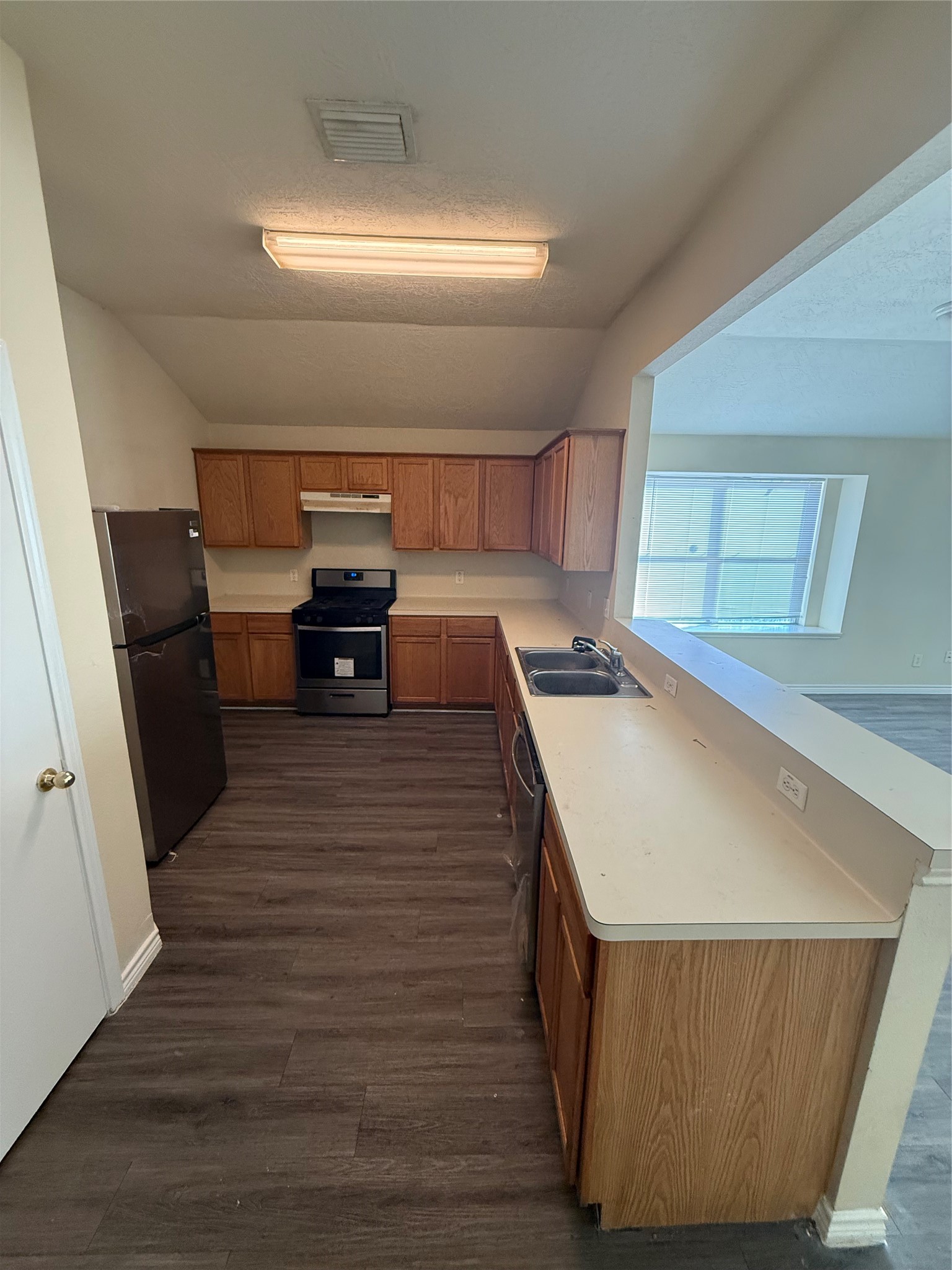 10918 Jutland Road Houston, TX 77048 - Photo 2 of 11 a room with wooden floor and furniture