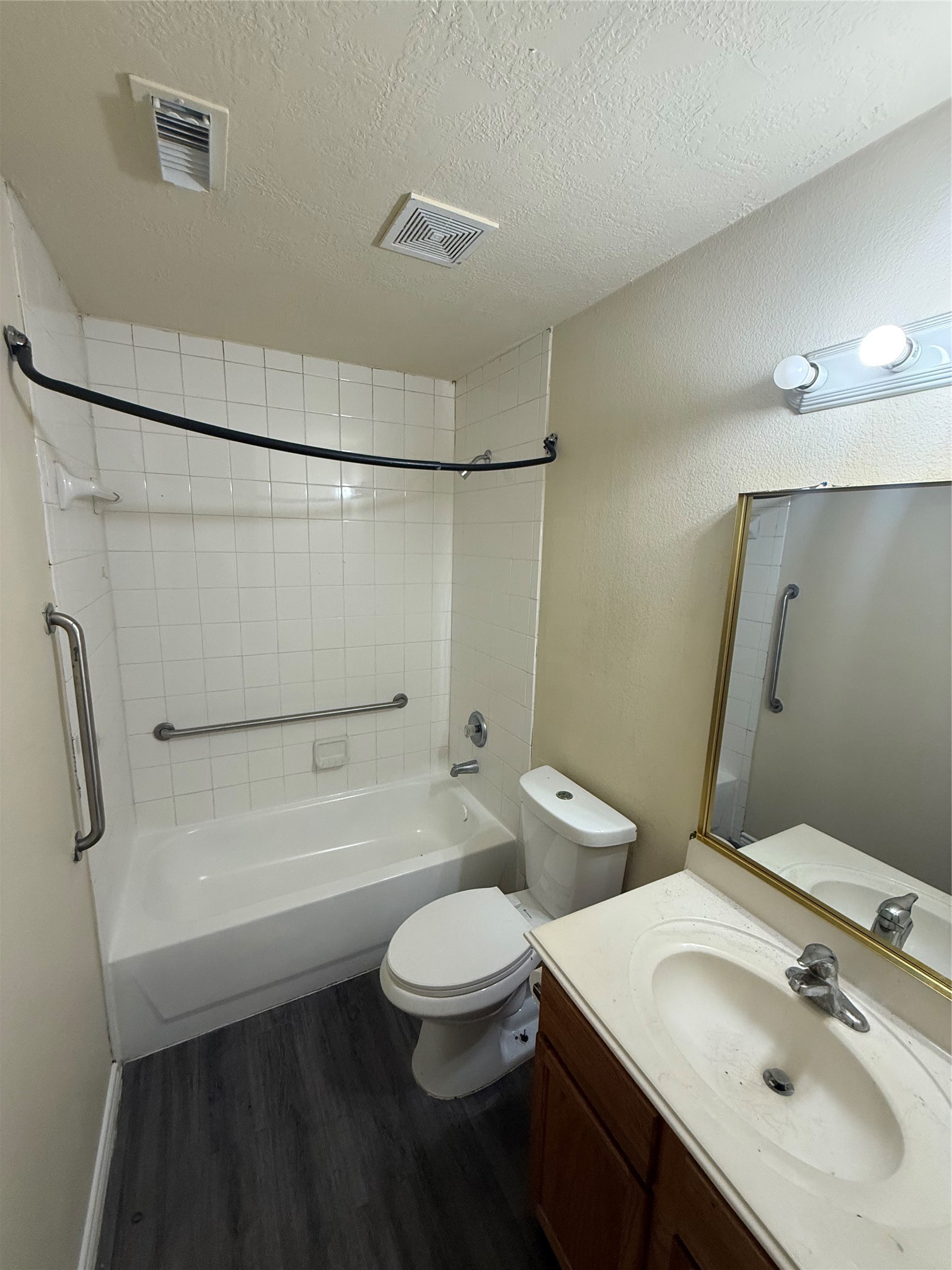 10918 Jutland Road Houston, TX 77048 - Photo 9 of 11 a bathroom with a sink a toilet and shower