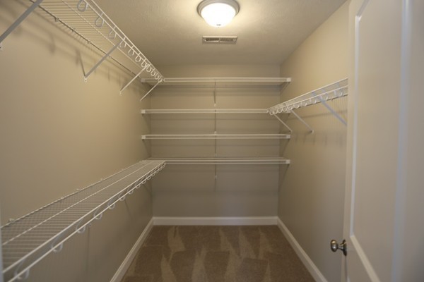 1 Fox Hill Road Ashland, MA 01721 - Photo 11 of 15 a view of a room with racks on the wall