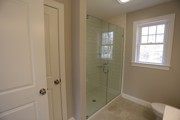 1 Fox Hill Road Ashland, MA 01721 - Photo 13 of 15 a bathroom with a shower and toilet