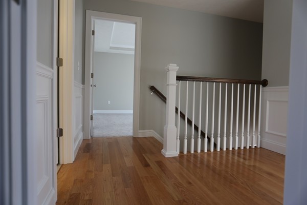 1 Fox Hill Road Ashland, MA 01721 - Photo 9 of 15 a view of a hallway with wooden floor