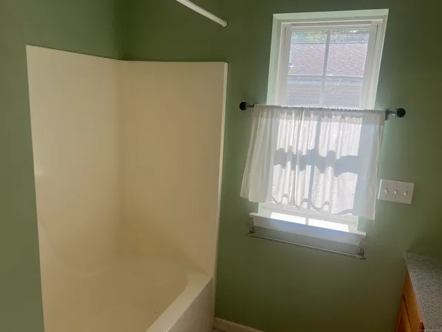 a bathroom with a bathtub