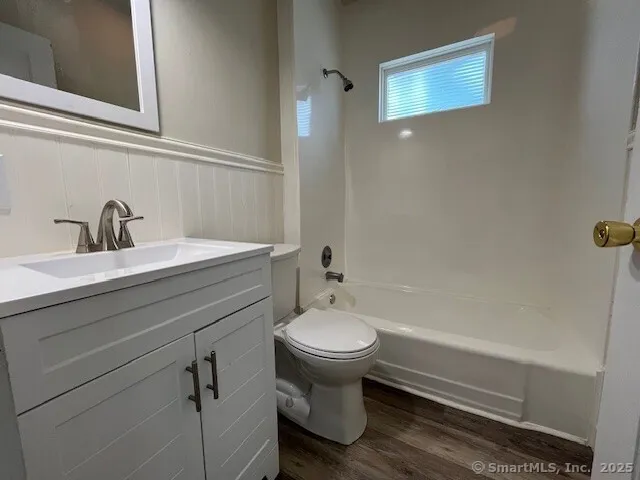 a bathroom with a sink and a toilet