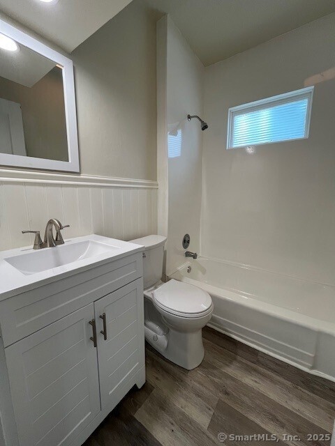 1946 Chapel Street New Haven, CT 06515 - Photo 13 of 18 a bathroom with a toilet a sink and bathtub