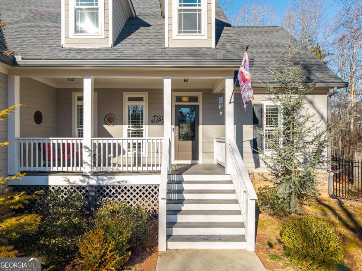 96 Morgan Trail, Unit 15R Ellijay, GA 30536 - Photo 16 of 42 a front view of a house with a porch
