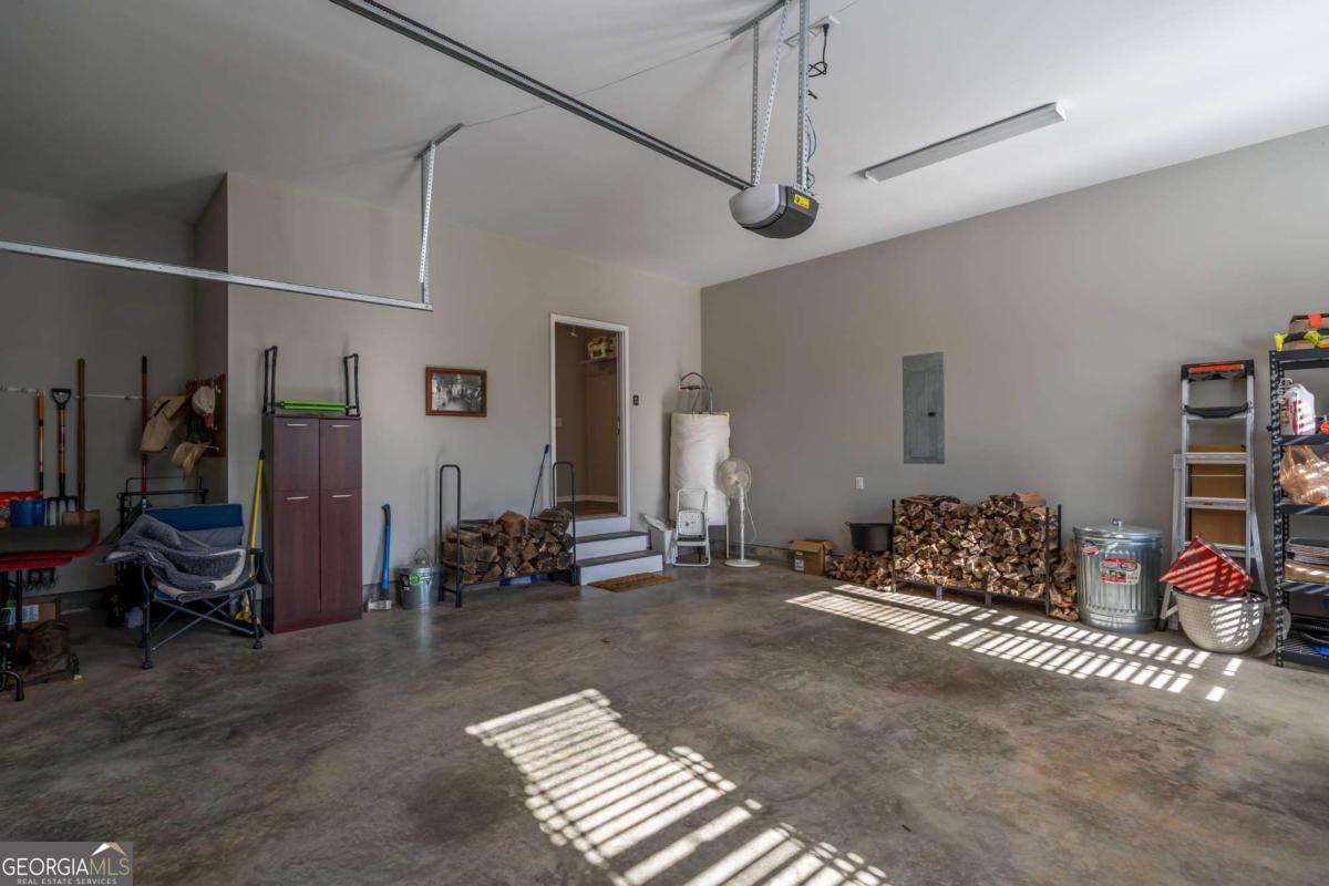 96 Morgan Trail, Unit 15R Ellijay, GA 30536 - Photo 41 of 42 a bedroom with furniture and a window