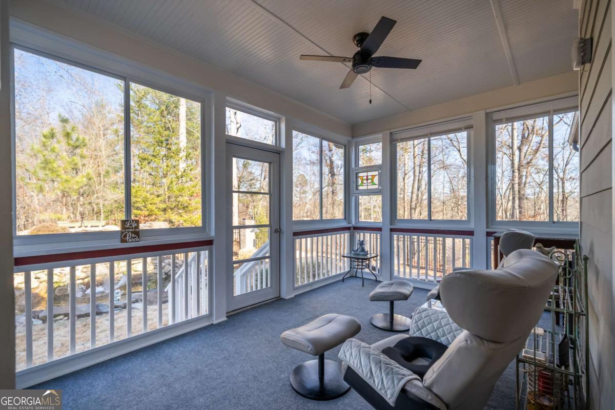 96 Morgan Trail, Unit 15R Ellijay, GA 30536 - Photo 42 of 42 a living room with furniture and a large window