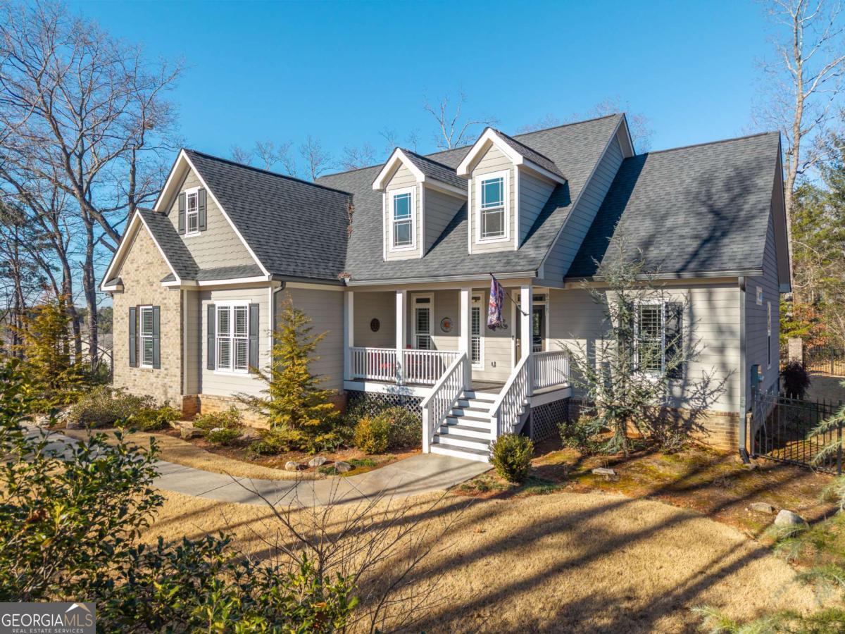96 Morgan Trail, Unit 15R Ellijay, GA 30536 - Photo 5 of 42 a front view of house with yard outdoor seating