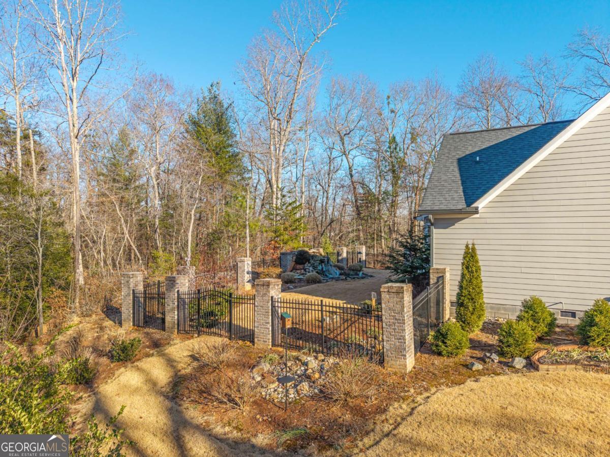 96 Morgan Trail, Unit 15R Ellijay, GA 30536 - Photo 9 of 42 a view of a backyard of the house