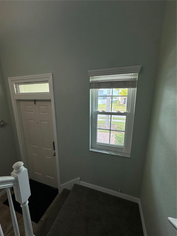 11832 Lake Boulevard New Port Richey, FL 34655 - Photo 24 of 58 a view of an empty room with a window