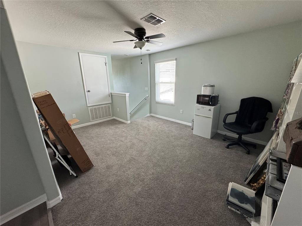 11832 Lake Boulevard New Port Richey, FL 34655 - Photo 26 of 58 a view of a room with gym equipment