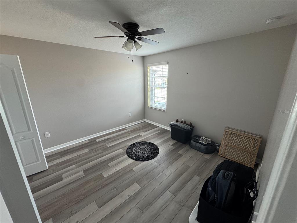 11832 Lake Boulevard New Port Richey, FL 34655 - Photo 43 of 58 a view of entryway with workspace and wooden floor