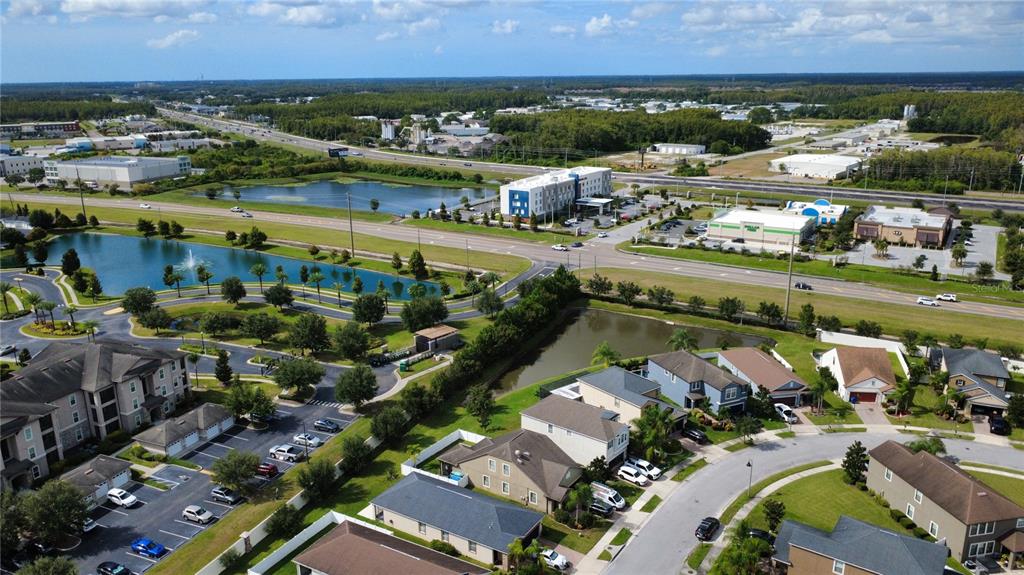 11832 Lake Boulevard New Port Richey, FL 34655 - Photo 53 of 58 an aerial view of residential building and lake