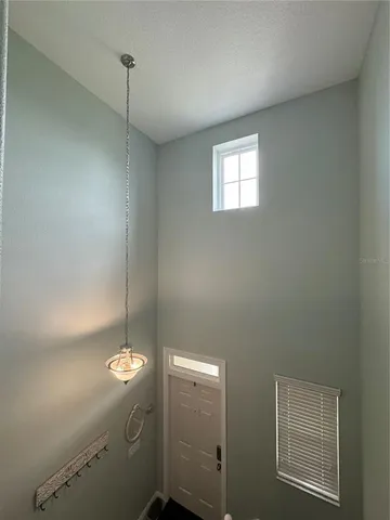 a large kitchen with a large counter top stainless steel appliances and a counter top space